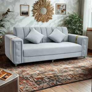 Modern light grey sofa with gold accents